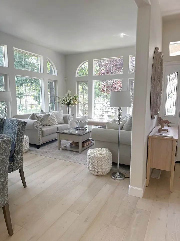 Living room with light wood floors cleaned and arranged in a Reno home